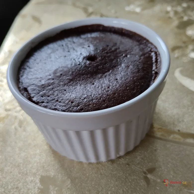 Hot chocolate dessert in ramekin after microwave baking.