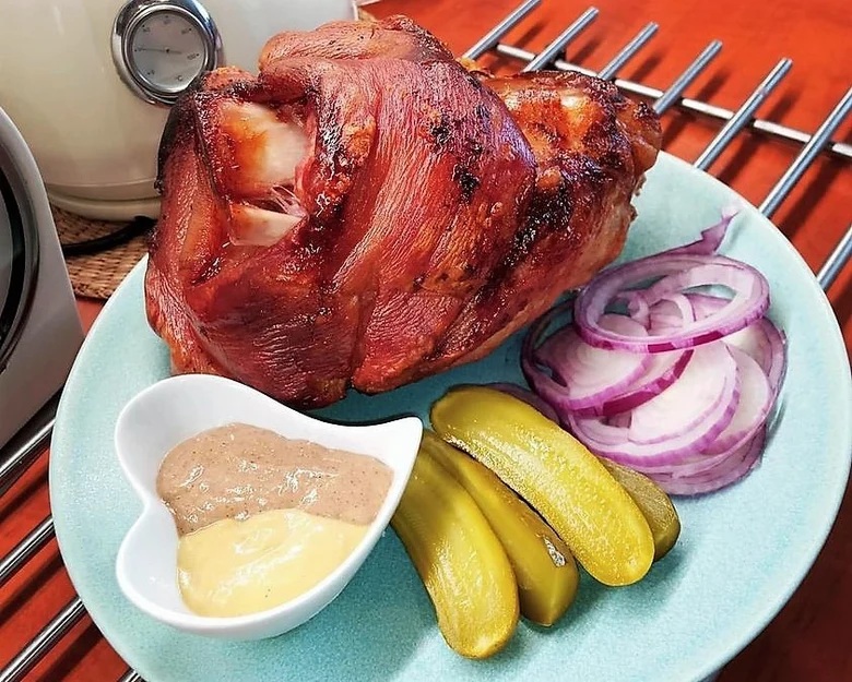 Roasted pork knuckle with sides